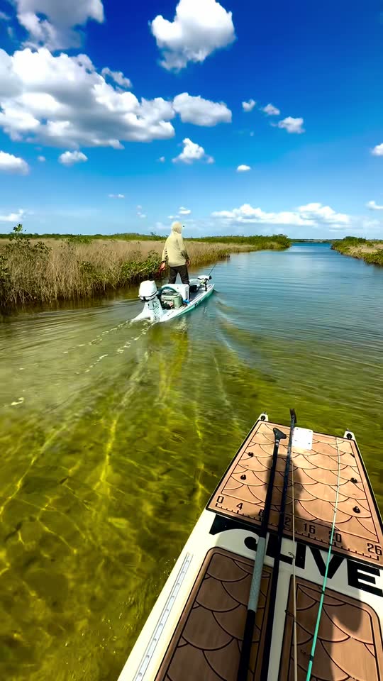 David and his son on the water with their SUP Customs hybrid skiffs